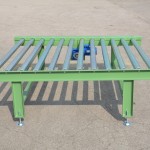 Rollers for belt conveyors